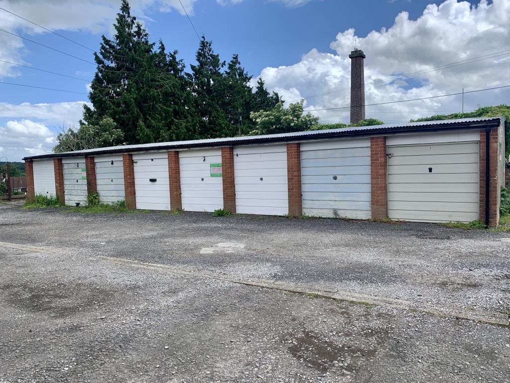 Lot: 98 - BLOCK OF EIGHT GARAGES, PLUS PARKING SPACE WITH POTENTIAL -